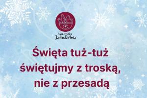 Baner informacyjny. Na zimowym błękitnym tle z płatkami śniegu umieszczono logo swarzędzkiej jadłodzielni i tytuł artykułu: Święta tuż tuż i tak dalej.